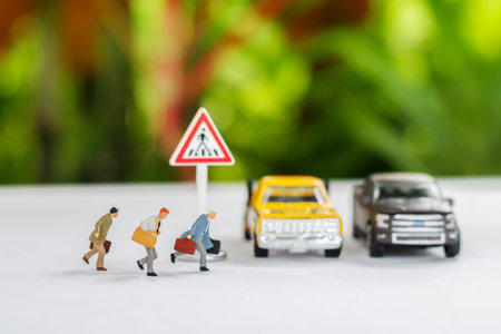 Miniature people running cross the road go to work office, business concept.
の写真素材