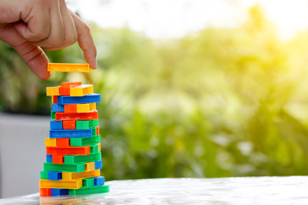 Colorful plastic blocks stack game - Stock Image - Everypixel