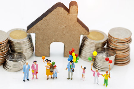 Miniature people, family and children enjoy with colorful balloons, happy family day concept.の写真素材