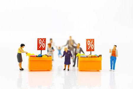 Miniatrue people: Shoppers buy goods on sale with discount tray. Tourism, shopping or business...