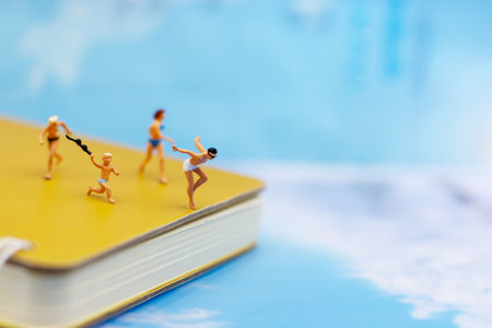 Miniature people: Tourists Sunbathing on the beach. Concept of traveling, business concept.の写真素材