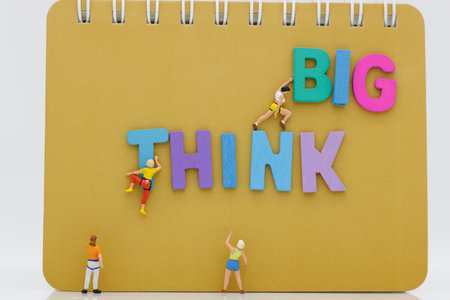 Miniature people climbing achieving top. Success, Target and growth in business concept.