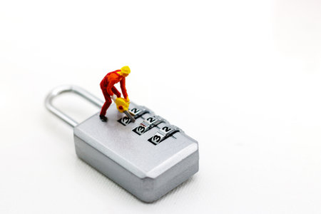 Miniature people are decrypting unlock padlock, Decrypt the key. concept for data security breach,...