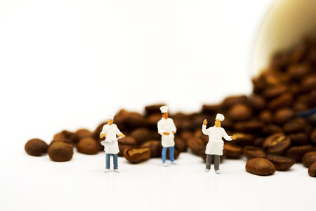 Miniature people: Group of chef standing with coffee bean and cup of coffee. Coffee time conceptの写真素材