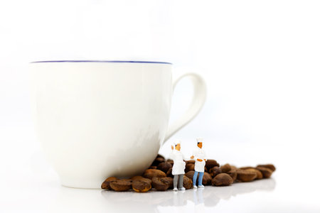 Miniature people: Group of chef standing with coffee bean and cup of coffee. Coffee time conceptの写真素材