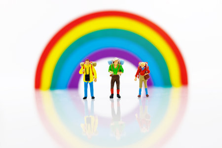 Miniature people: Traveller with backpack walking on the path of tourism. Travel, explore and adventure conceptの写真素材