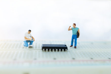 Miniature people searching or checking for bugs and issue on microchip, mainboard of computer....