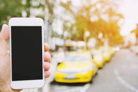 people of hand holding show white mobile smart phone with blank empty screen. space for text or...