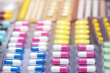 close up pharmaceuticals antibiotics pills medicine in blister packs. colorful antibacterials pills Pharmacy background.の写真素材