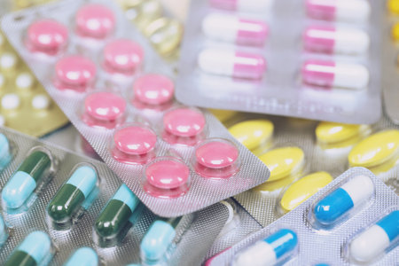 close up pharmaceuticals antibiotics pills medicine in blister packs. colorful antibacterials pills Pharmacy background. capsule pill medicine Antimicrobial drug resistance. Pharmaceutical industryの写真素材