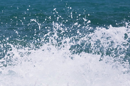 Sea Waves in ocean wave Splashing Ripple Water. Blue water background.