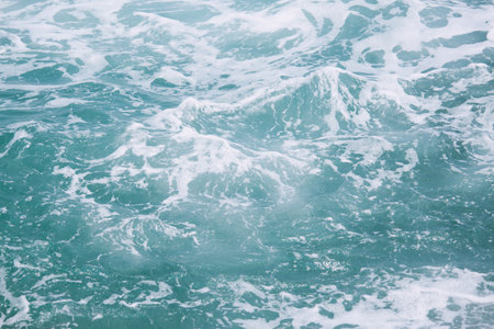 Sea Waves in ocean wave Splashing Ripple Water. Blue water background.の写真素材