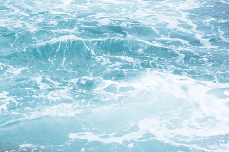 Sea Waves in ocean wave Splashing Ripple Water. Blue water background.の写真素材
