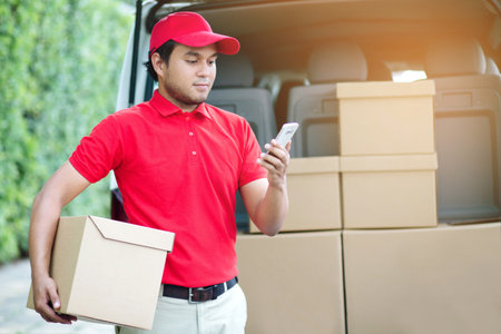 parcel delivery man of a package through a service. and close up hand customer accepting a delivery...