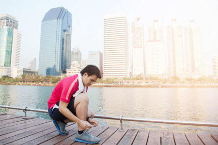Urban joggers on a big bridge wooden.の写真素材