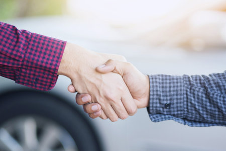Good deal. Close-up of handshaking. Smooth business.の写真素材