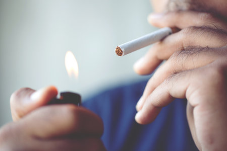 man smoking a cigarette. Cigarette smoke spread.