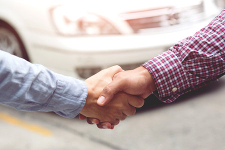 Good deal. Close-up of handshaking. Smooth business.の写真素材