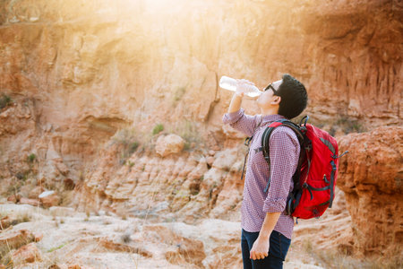 Man drinking water from bottle.の写真素材
