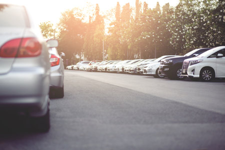 Cars parked in the parking lot.Open space area Outdoors.の写真素材