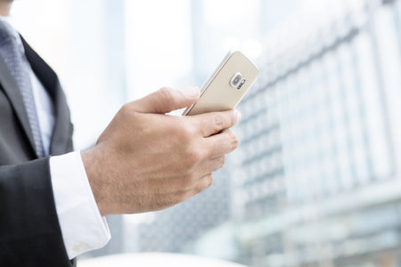 close up of businessman using telephone to contact the job. or Business man Contact Customer.の写真素材