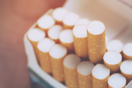 peel it off Cigarette pack prepare smoking a cigarette. Packing line up. photo filters Natural light. soft focus.の写真素材