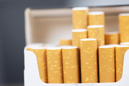 peel it off Cigarette pack prepare smoking a cigarette. Packing line up. photo filters Natural light.の写真素材