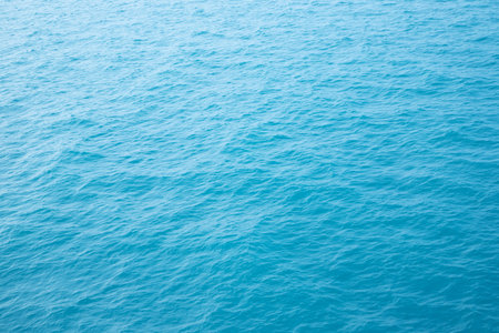 Sea Waves in ocean wave Splashing Ripple Water. Blue water background.の写真素材