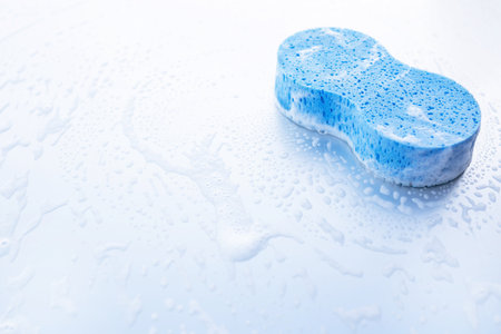 Outdoor car wash with foam soap.