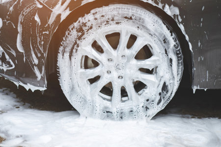 Outdoor car wash with active foam soap. commercial cleaning washing service concept.の写真素材