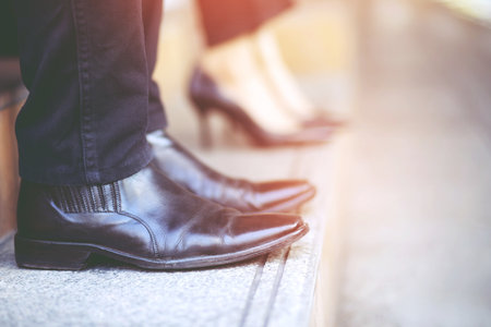 Businessmen stand abstain Social distance against COVID 19の写真素材