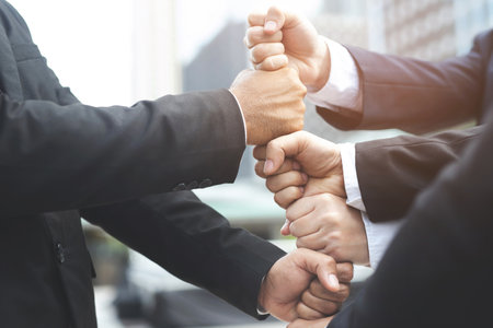 Give me five your clap hands articulate group businessman for good business team. concept Success and encouragement to overcome and overcame obstacles business solution strategy.の写真素材