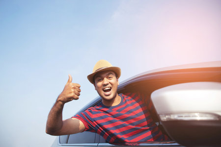 tourist Happy driving to the sea, mountains.の写真素材