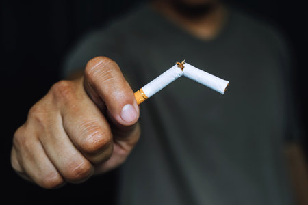 Man refusing cigarette holding in hand concept for quitting smoking and healthy lifestyle.or No...