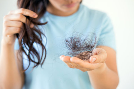 Woman have hair loss due to allergic to shampooの写真素材