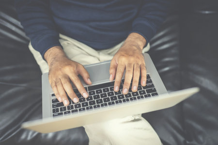 Staff working at home By using a computer with high speed internet, contact to buy - sell products with customersの写真素材