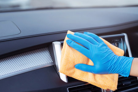 Staff is cleaning in the car