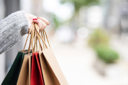 A woman is shopping at the mallの写真素材
