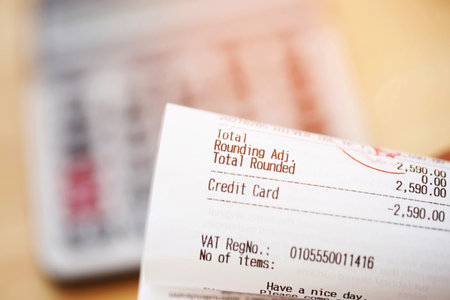 Accountants are calculating financial statements and cash bills for annual taxes.の写真素材