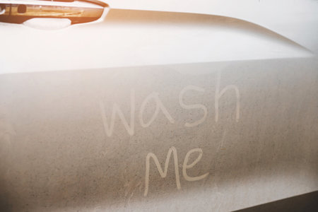 Dirty cars waiting to be cleaned at the car wash shop.の写真素材