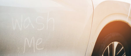 Dirty cars waiting to be cleaned at the car wash shop.
