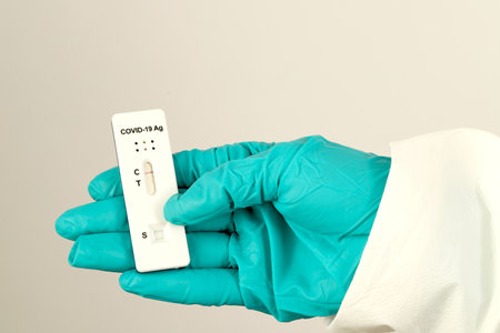 Doctor ready  for Covid-19 test kit