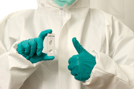 Doctor with Covid-19 test kit from the lab at the hospital