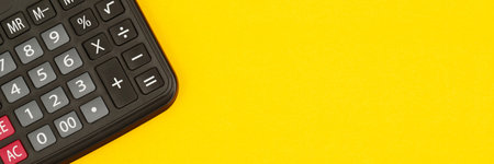 calculator for accountant on yellow background