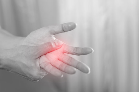 Wrist pain is one of the symptomsの写真素材