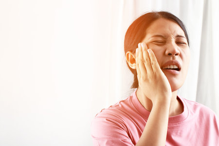 Toothache is most often caused by tooth decay. Patients often have sensitive teeth. or have toothache Sometimes painkillers can't help!の写真素材