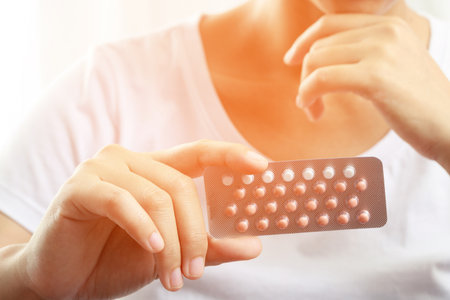 Woman take birth control pills before sex.の写真素材