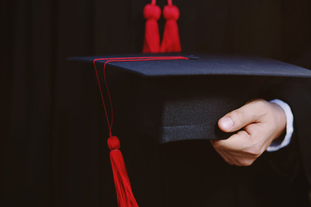 graduation,Student hold hats in hand during commencement success graduates of the university,Concept...