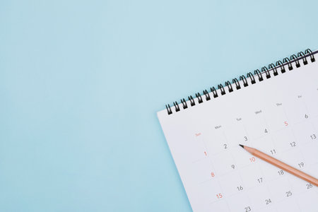 calendar on the blue. empty copy space for text. concept for busy timeline organize...