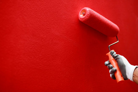 Painter is painting the interior wall redの写真素材